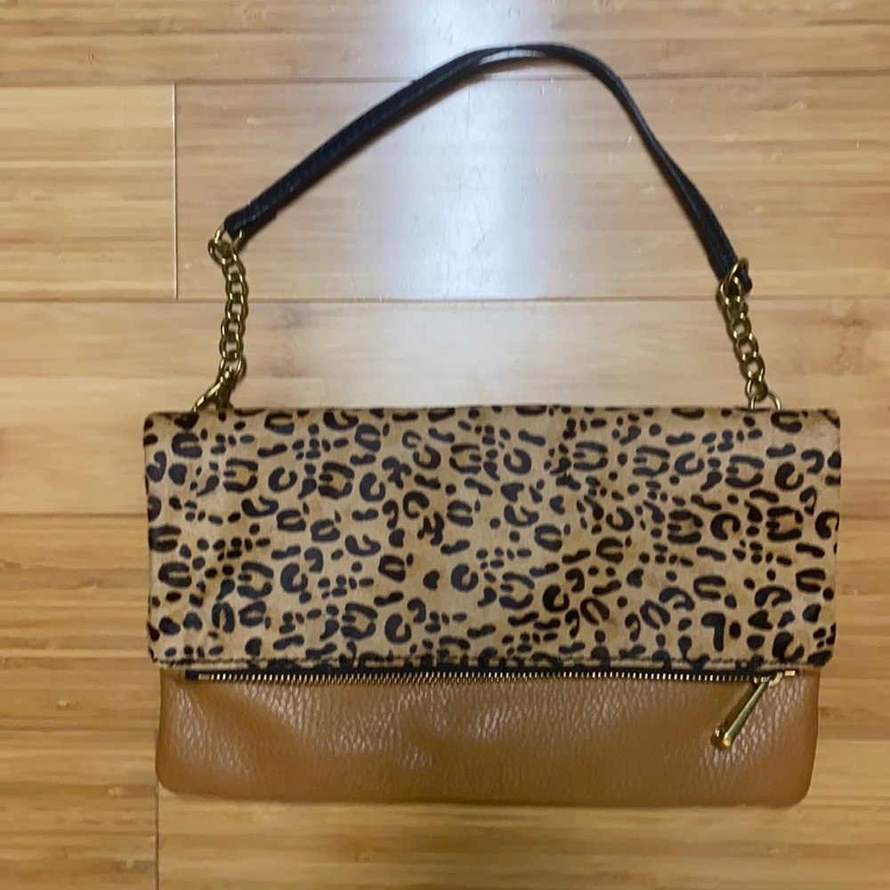 Fossil fold over purse